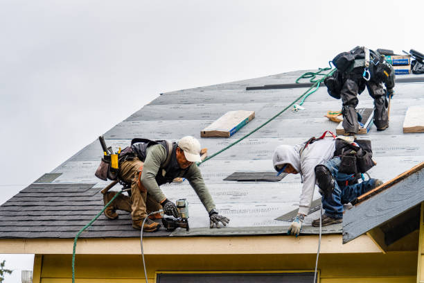 Professional Gutter Installation technician working in Bartlesville, OK